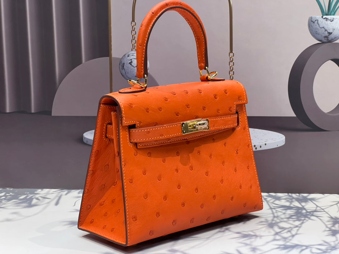 HERMES KELLY BAG 20 IN FIRE ORANGE OSTRICH LEATHER WITH GOLD HARDWARE