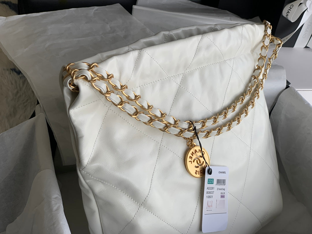 CHANEL LARGE 42 HANDBAG IN WHITE SHINY CALFSKIN GOLD HARDWARE