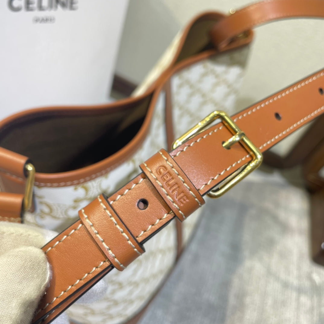 CELINE BUCKET 33 IN WHITE TRIOMPHE CANVAS AND BRONZE BROWN CALFSKIN TRIM