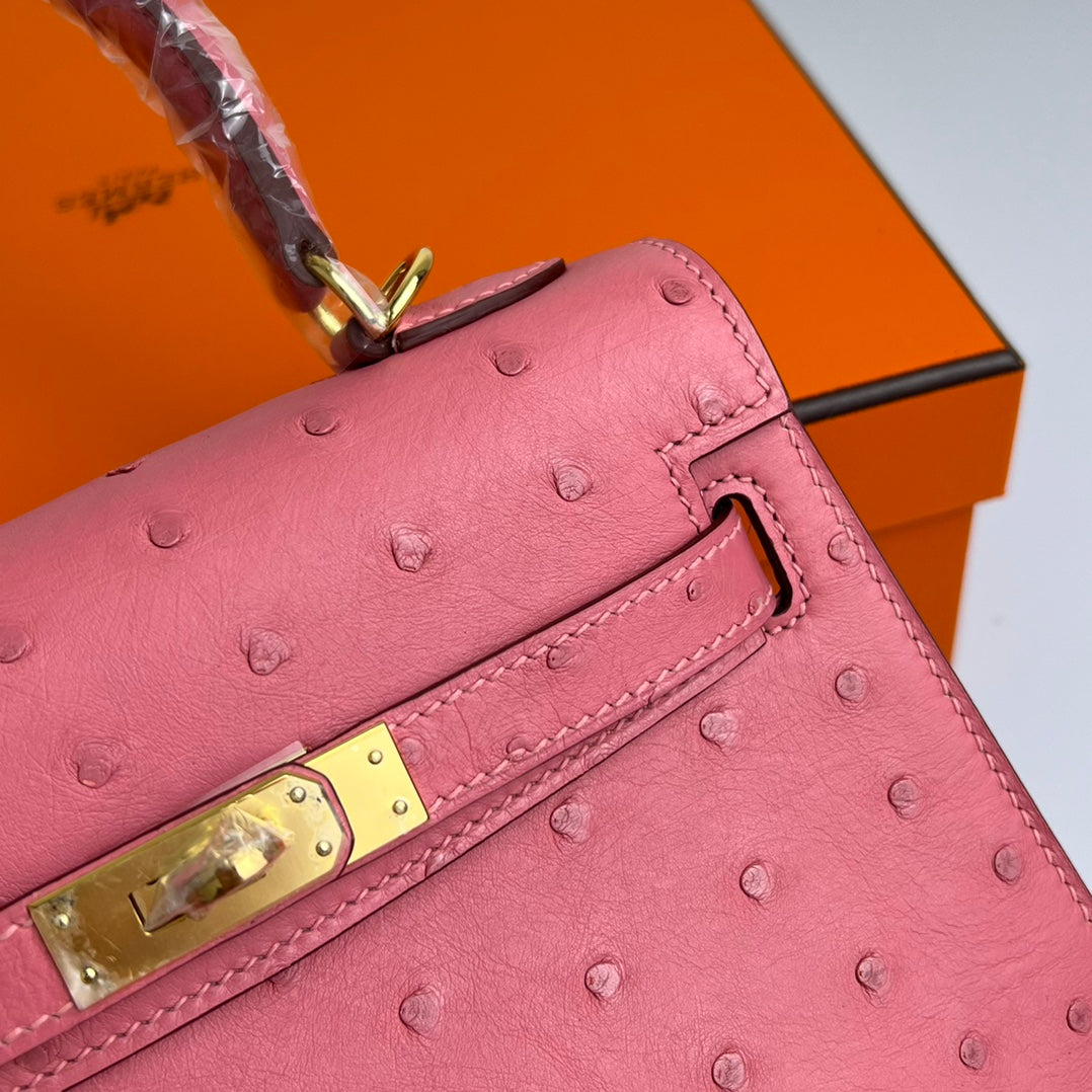 HERMES KELLY BAG 20 IN ROUGE PINK OSTRICH LEATHER WITH GOLD HARDWARE