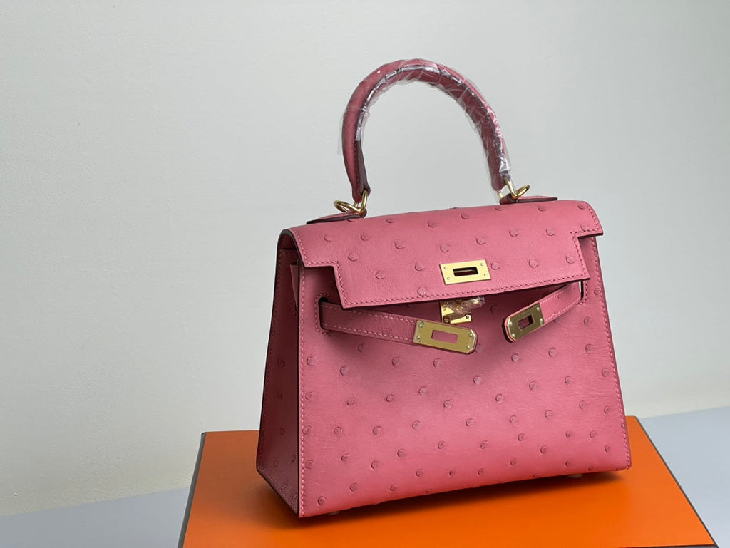 HERMES KELLY BAG 20 IN ROUGE PINK OSTRICH LEATHER WITH GOLD HARDWARE