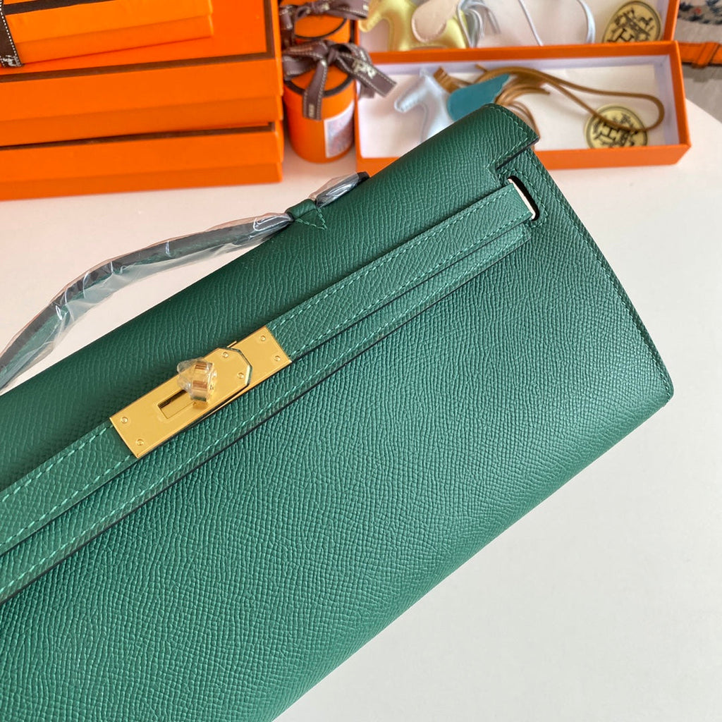 HERMES KELLY CUT 31 IN GREEN FOREST CALFSKIN WITH GOLD HARDWARE