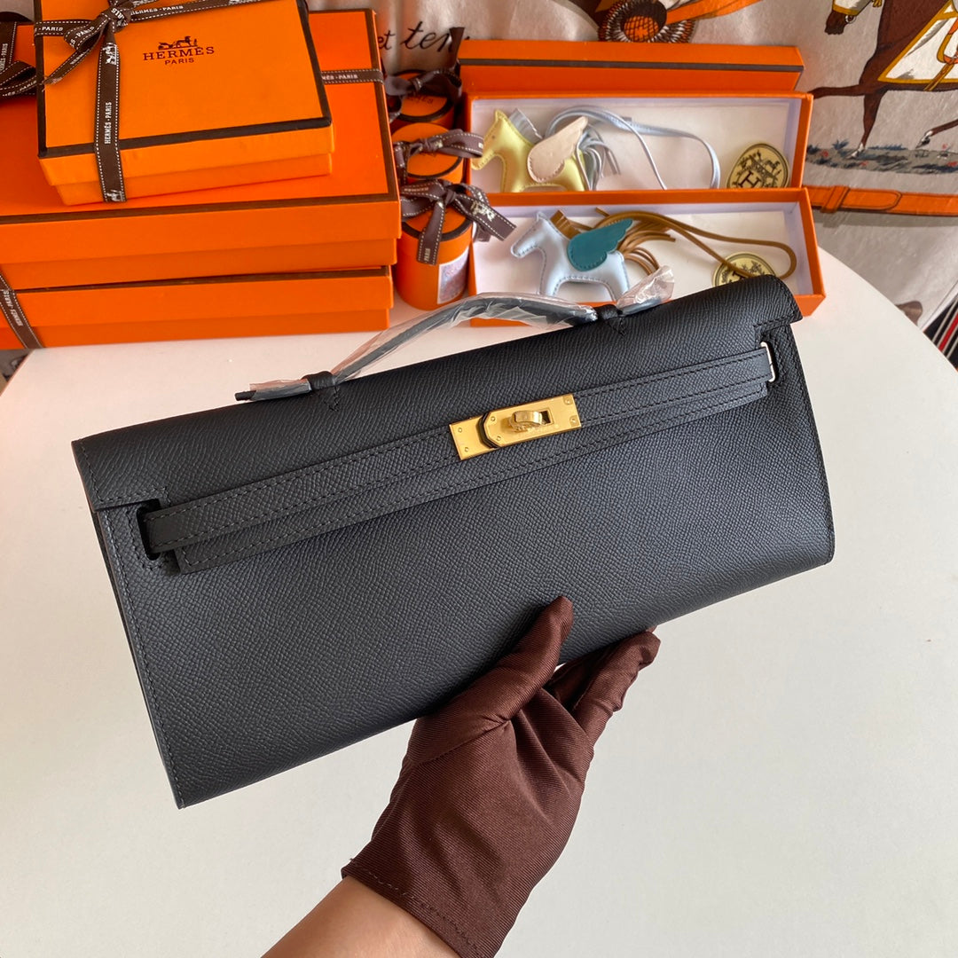HERMES KELLY CUT 31 IN BLACK CALFSKIN WITH GOLD HARDWARE