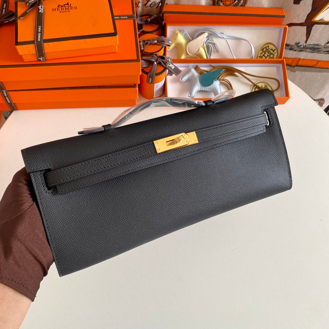 HERMES KELLY CUT 31 IN BLACK CALFSKIN WITH GOLD HARDWARE