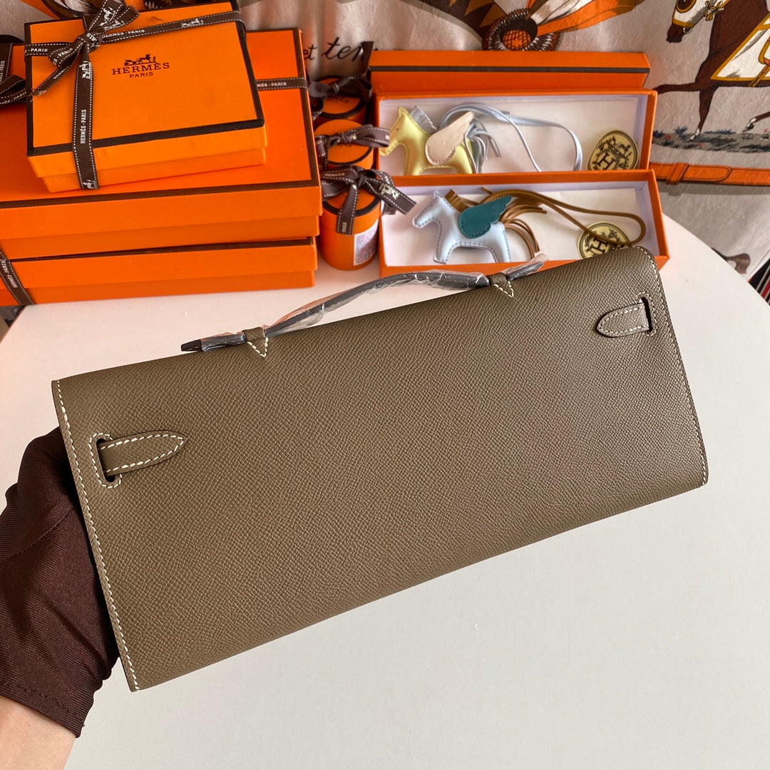 HERMES KELLY CUT 31 IN MOCHA BROWN CALFSKIN WITH GOLD HARDWARE
