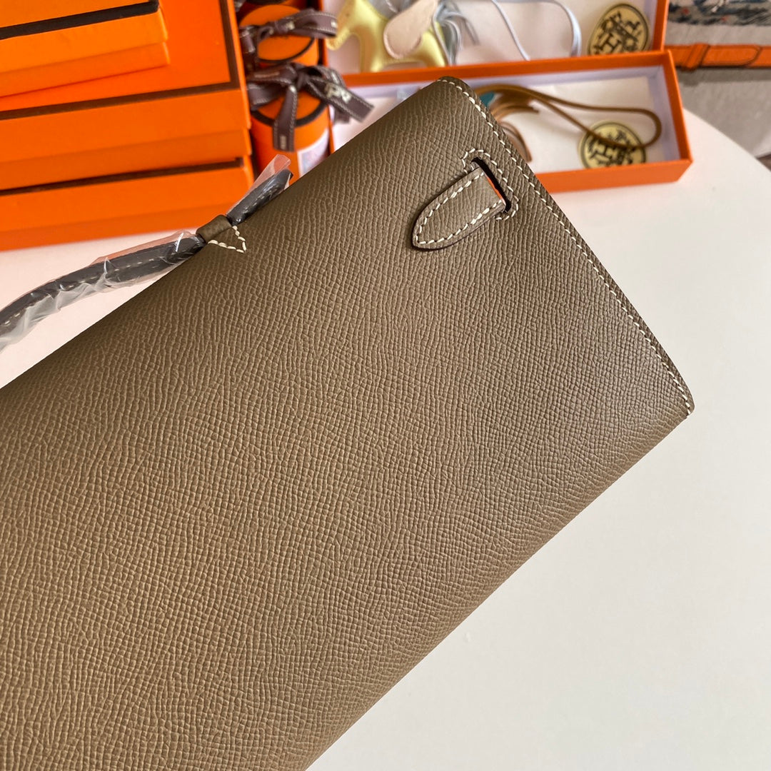 HERMES KELLY CUT 31 IN MOCHA BROWN CALFSKIN WITH GOLD HARDWARE