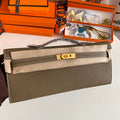 HERMES KELLY CUT 31 IN MOCHA BROWN CALFSKIN WITH GOLD HARDWARE