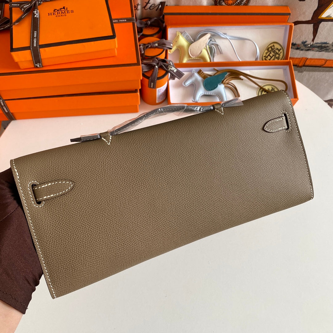 HERMES KELLY CUT 31 IN MOCHA BROWN CALFSKIN WITH SILVER HARDWARE