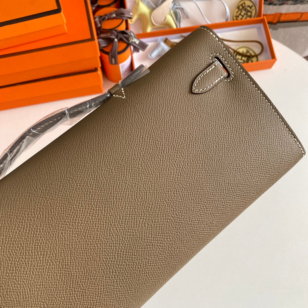 HERMES KELLY CUT 31 IN MOCHA BROWN CALFSKIN WITH SILVER HARDWARE