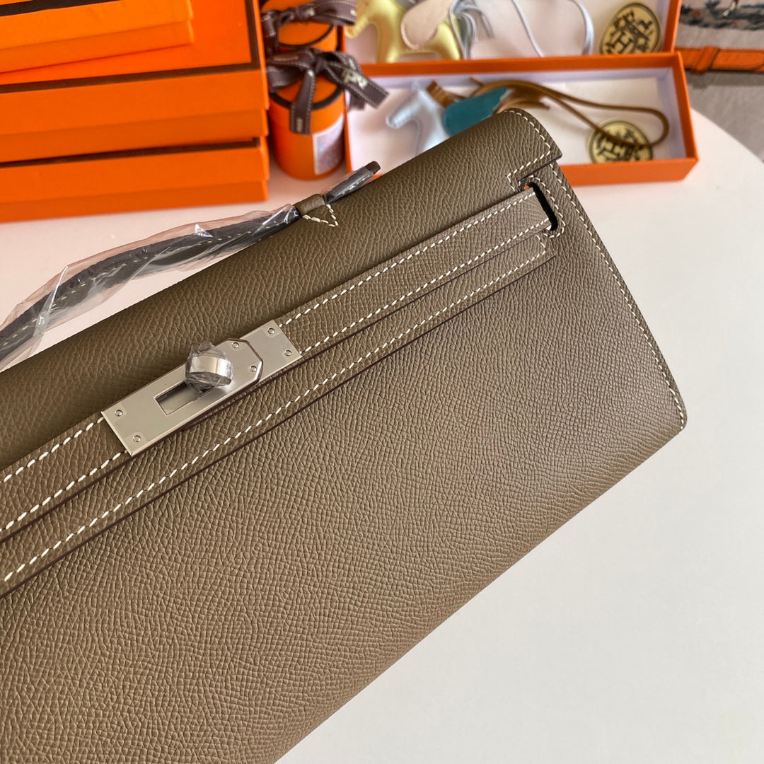 HERMES KELLY CUT 31 IN MOCHA BROWN CALFSKIN WITH SILVER HARDWARE