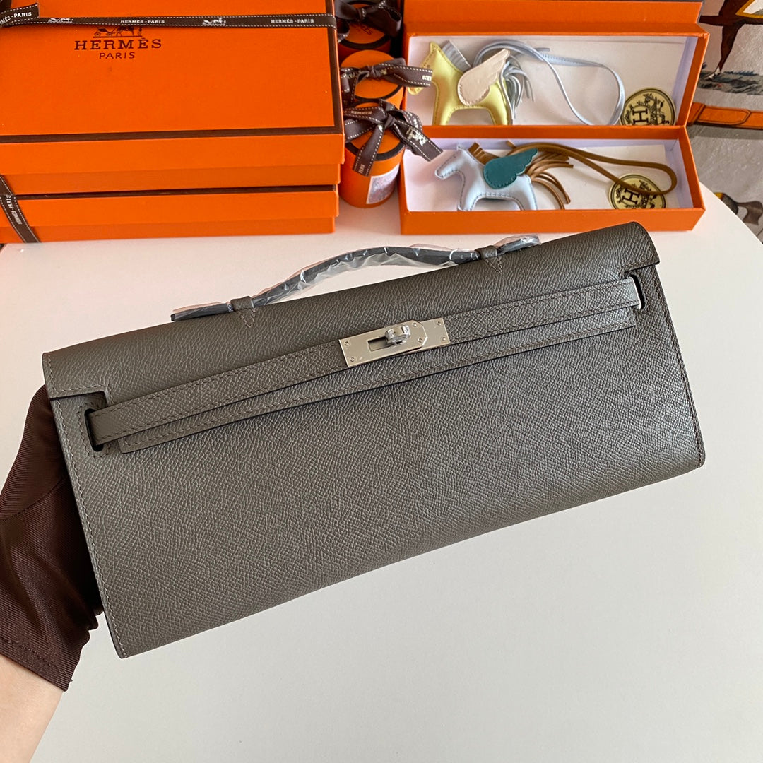 HERMES KELLY CUT 31 IN WOOD BROWN CALFSKIN WITH SILVER HARDWARE