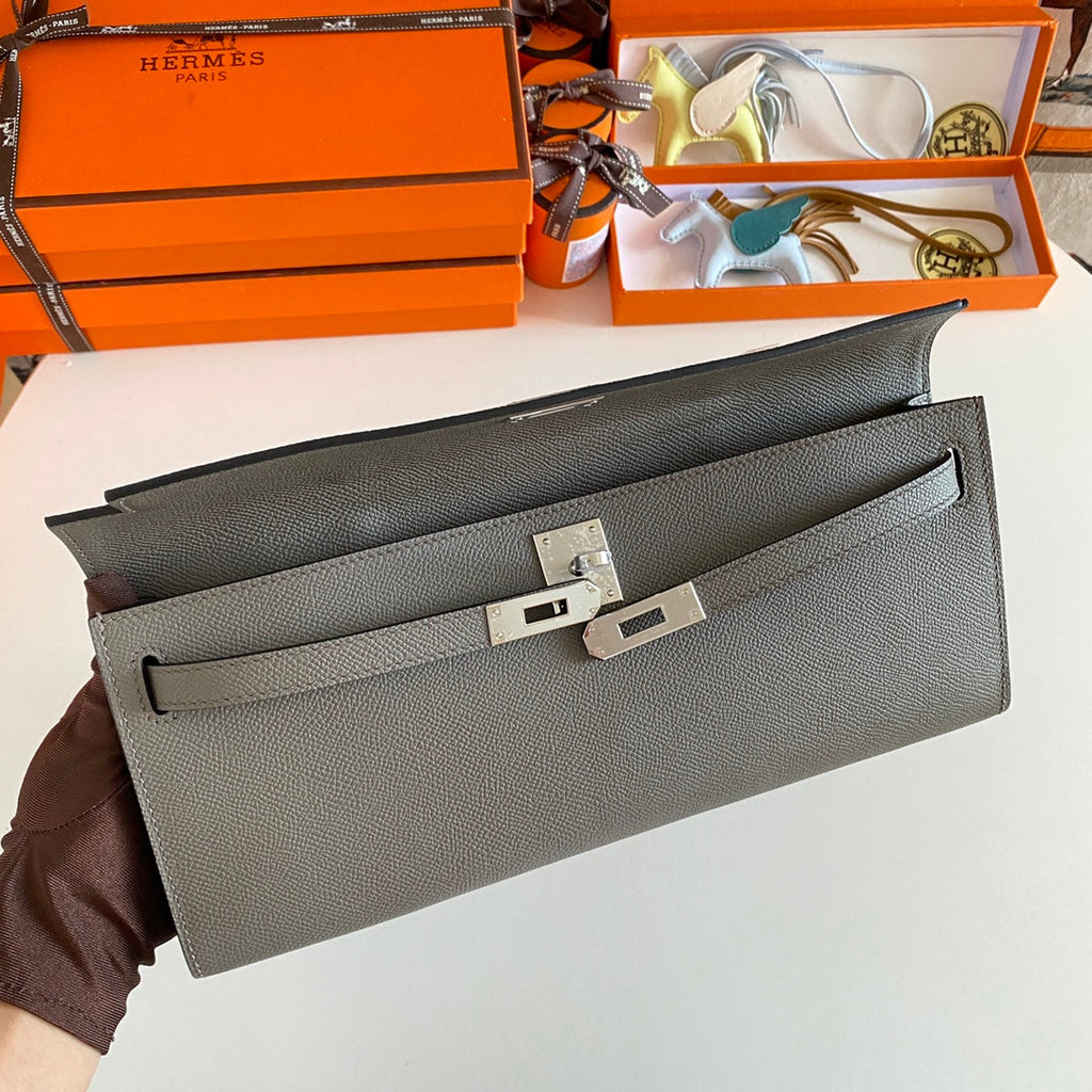 HERMES KELLY CUT 31 IN WOOD BROWN CALFSKIN WITH SILVER HARDWARE