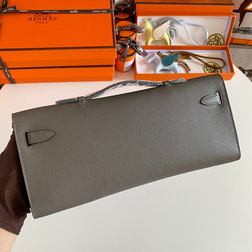 HERMES KELLY CUT 31 IN WOOD BROWN CALFSKIN WITH SILVER HARDWARE