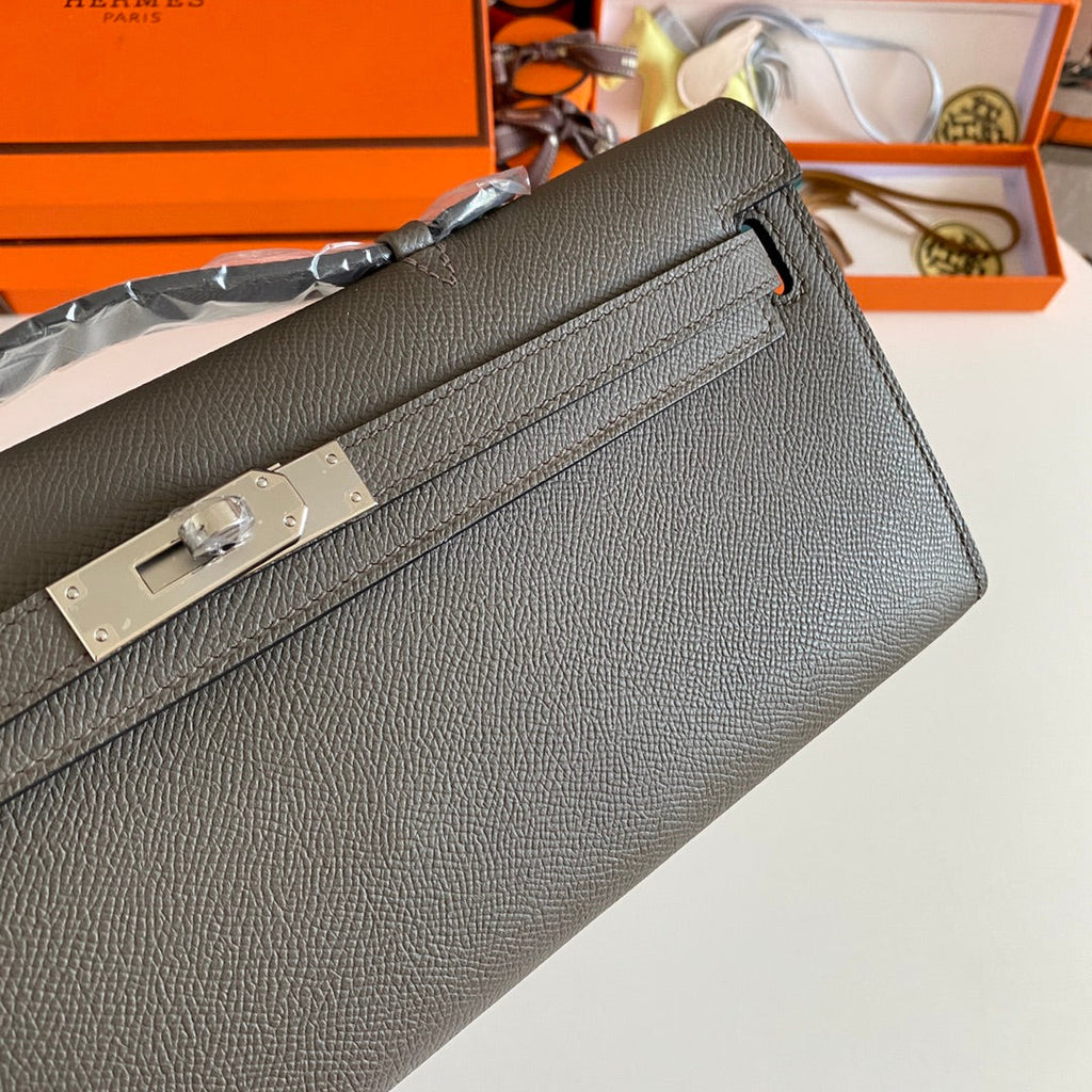 HERMES KELLY CUT 31 IN WOOD BROWN CALFSKIN WITH SILVER HARDWARE