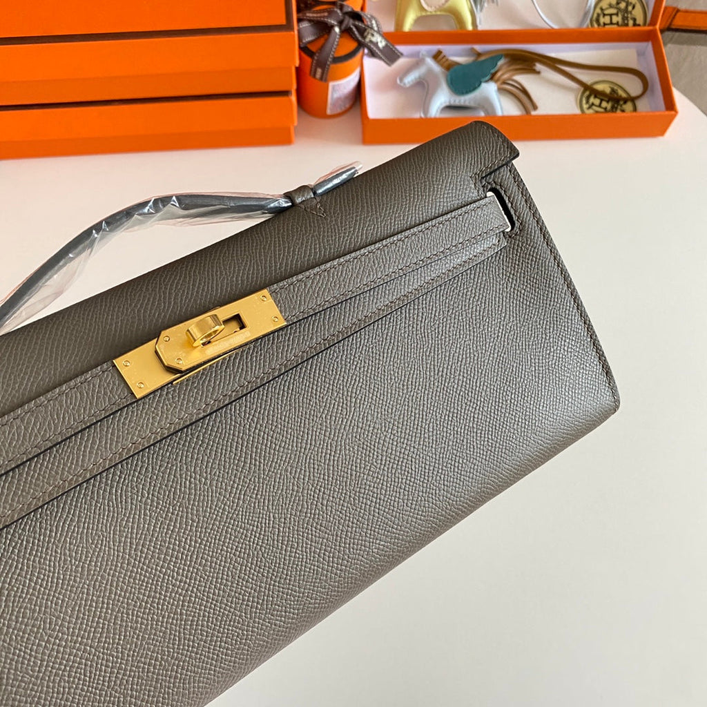 HERMES KELLY CUT 31 IN WOOD BROWN CALFSKIN WITH GOLD HARDWARE