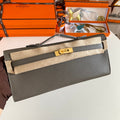 HERMES KELLY CUT 31 IN WOOD BROWN CALFSKIN WITH GOLD HARDWARE