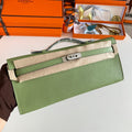 HERMES KELLY CUT 31 IN APPLE GREEN CALFSKIN WITH SILVER HARDWARE