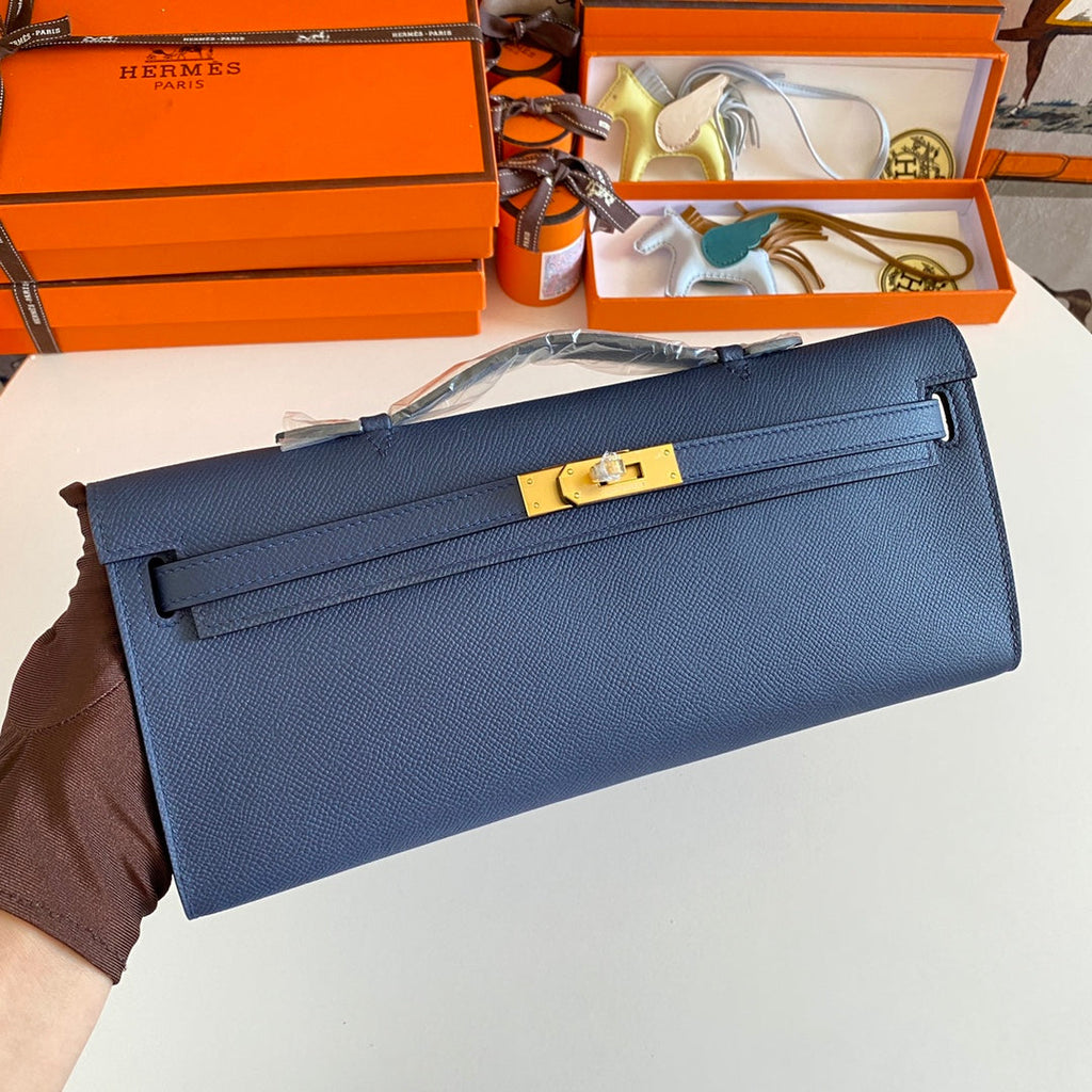 HERMES KELLY CUT 31 IN CLASSIC BLUE CALFSKIN WITH GOLD HARDWARE