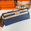HERMES KELLY CUT 31 IN CLASSIC BLUE CALFSKIN WITH SILVER HARDWARE