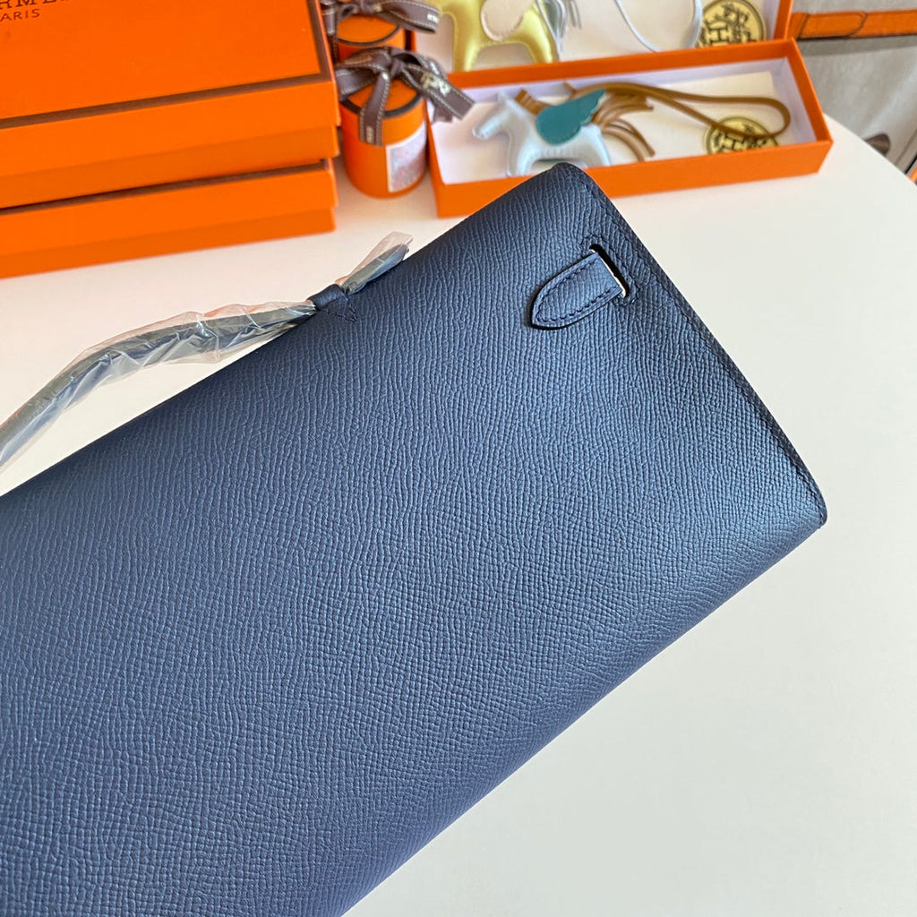 HERMES KELLY CUT 31 IN CLASSIC BLUE CALFSKIN WITH SILVER HARDWARE