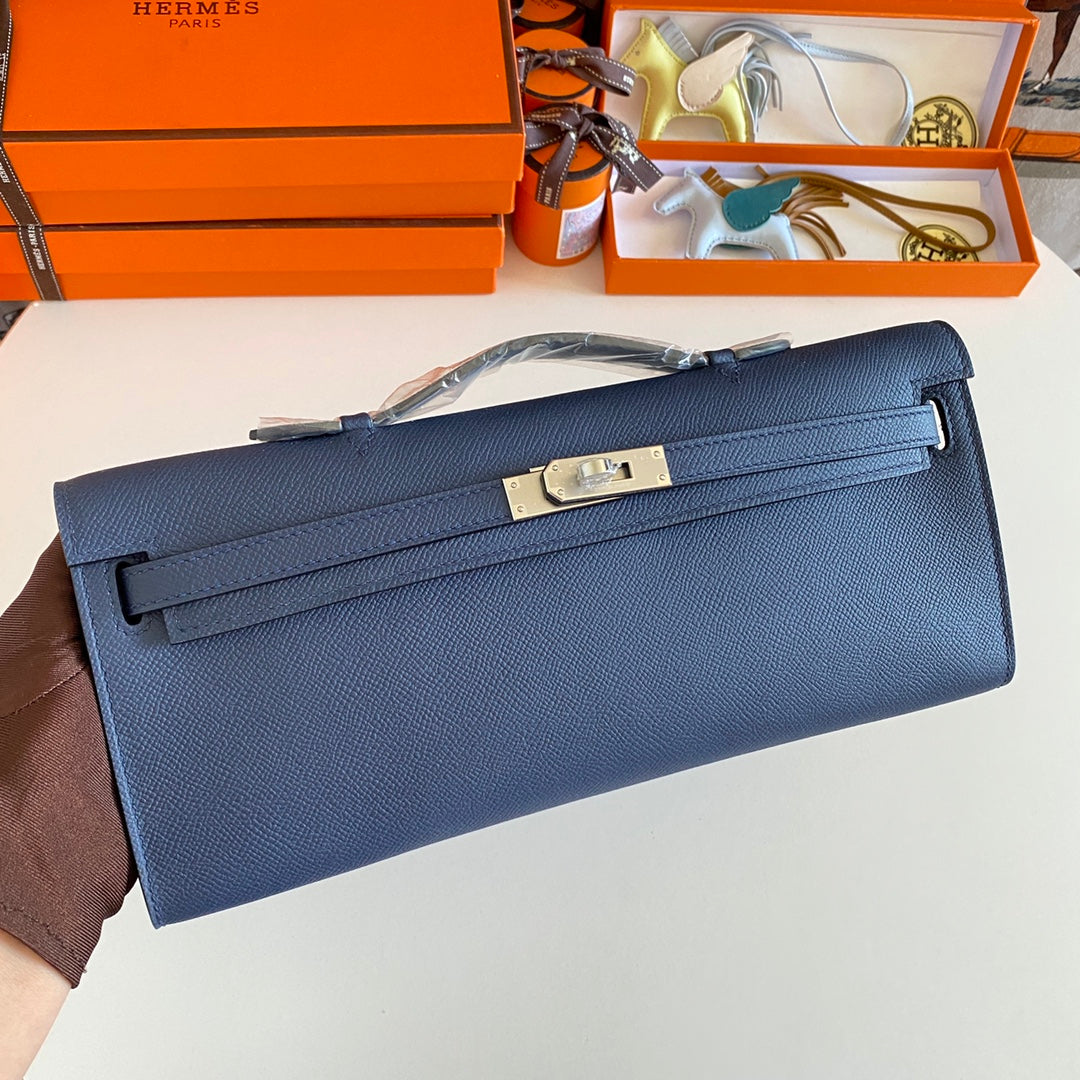 HERMES KELLY CUT 31 IN CLASSIC BLUE CALFSKIN WITH SILVER HARDWARE