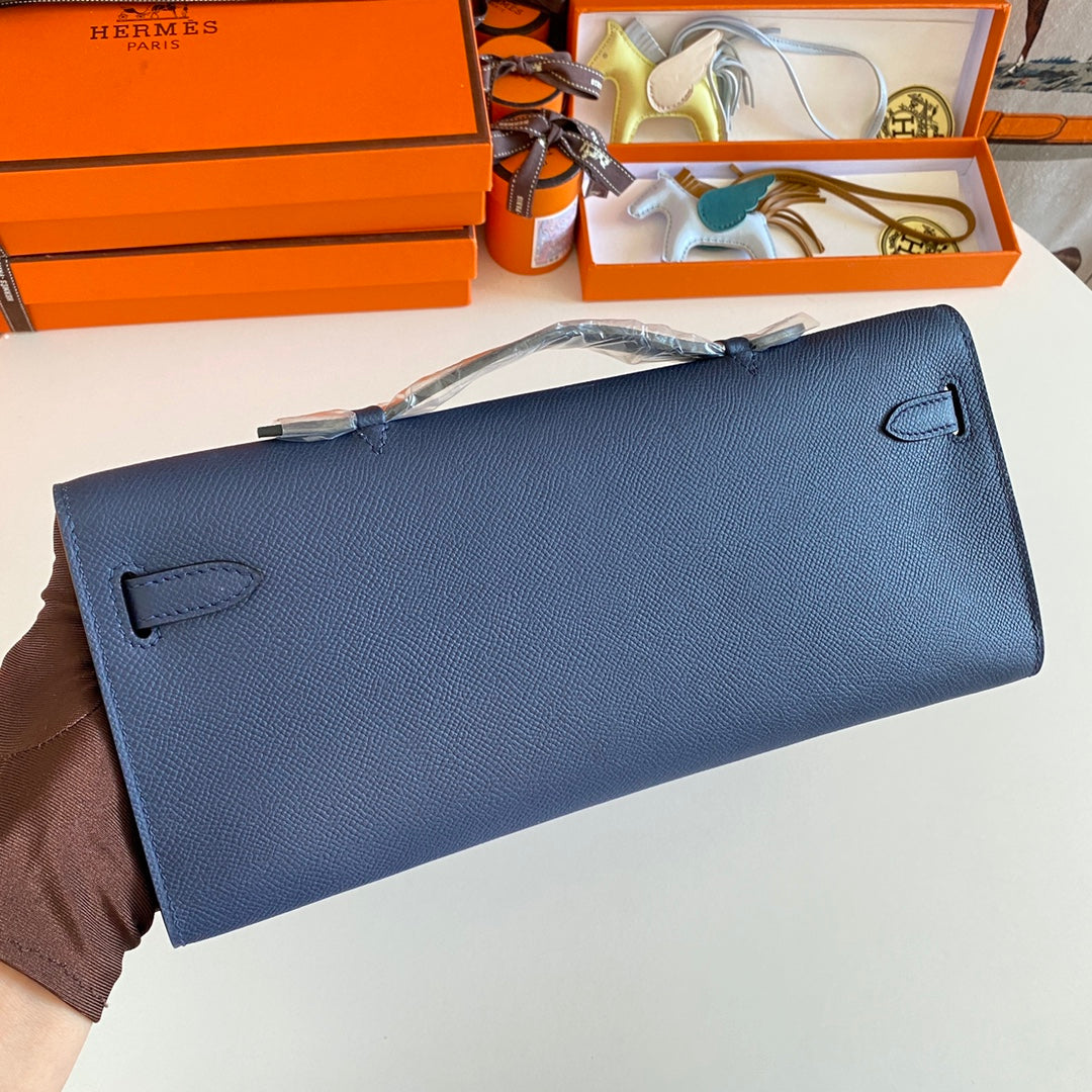 HERMES KELLY CUT 31 IN CLASSIC BLUE CALFSKIN WITH SILVER HARDWARE