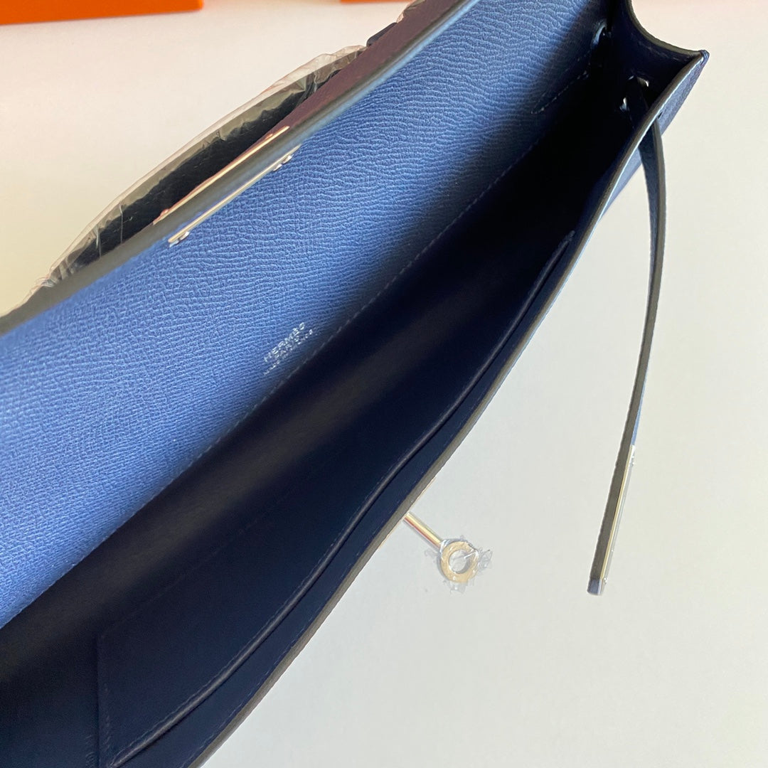 HERMES KELLY CUT 31 IN CLASSIC BLUE CALFSKIN WITH SILVER HARDWARE
