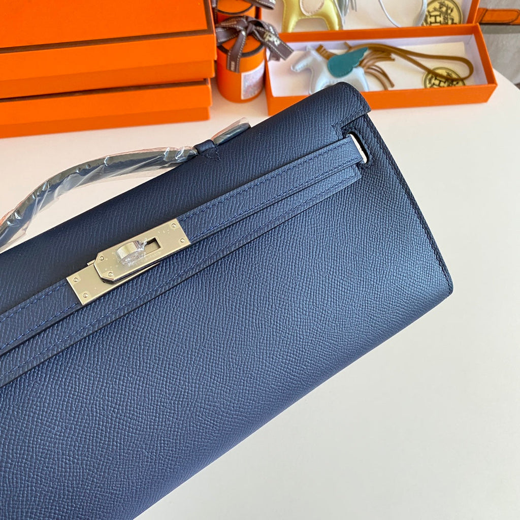 HERMES KELLY CUT 31 IN CLASSIC BLUE CALFSKIN WITH SILVER HARDWARE