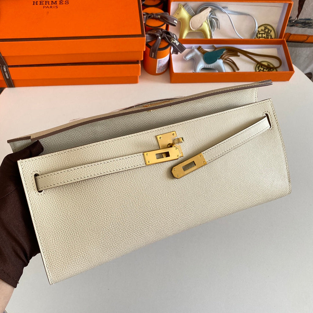 HERMES KELLY CUT 31 IN BEIGE CREAM CALFSKIN WITH GOLD HARDWARE