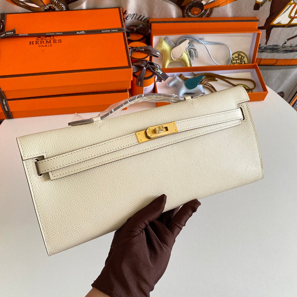HERMES KELLY CUT 31 IN BEIGE CREAM CALFSKIN WITH GOLD HARDWARE