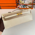HERMES KELLY CUT 31 IN BEIGE CREAM CALFSKIN WITH GOLD HARDWARE