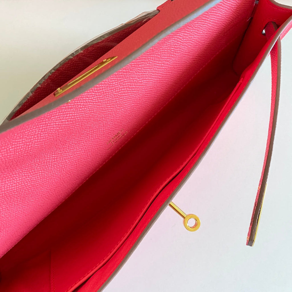 HERMES KELLY CUT 31 IN WATERMELON PINK CALFSKIN WITH GOLD HARDWARE