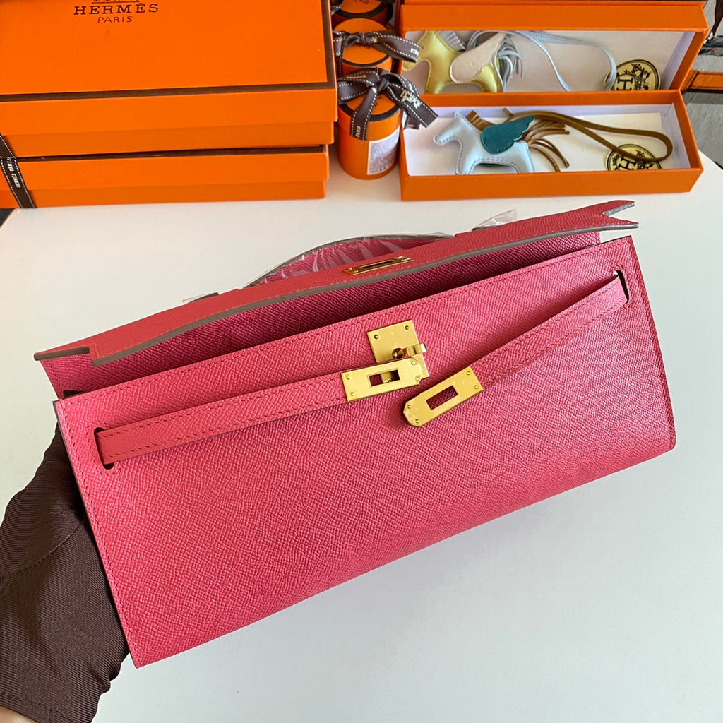 HERMES KELLY CUT 31 IN WATERMELON PINK CALFSKIN WITH GOLD HARDWARE