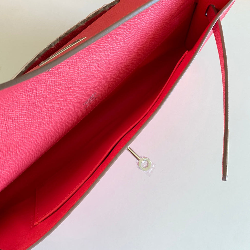 HERMES KELLY CUT 31 IN WATERMELON PINK CALFSKIN WITH SILVER HARDWARE