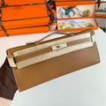 HERMES KELLY CUT 31 IN BRONZE BROWN CALFSKIN WITH SILVER HARDWARE