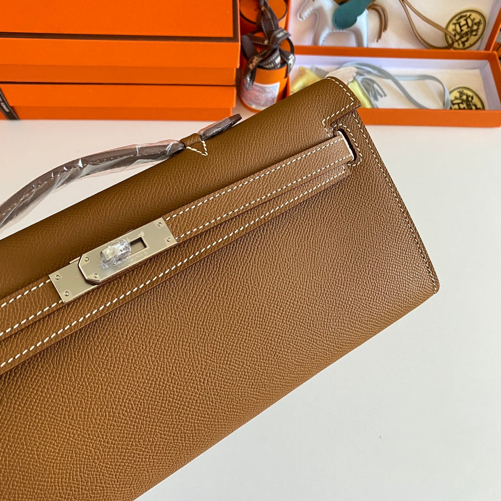 HERMES KELLY CUT 31 IN BRONZE BROWN CALFSKIN WITH SILVER HARDWARE