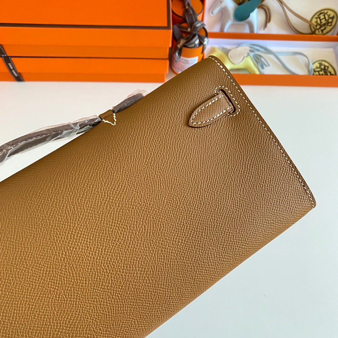 HERMES KELLY CUT 31 IN BRONZE BROWN CALFSKIN WITH SILVER HARDWARE