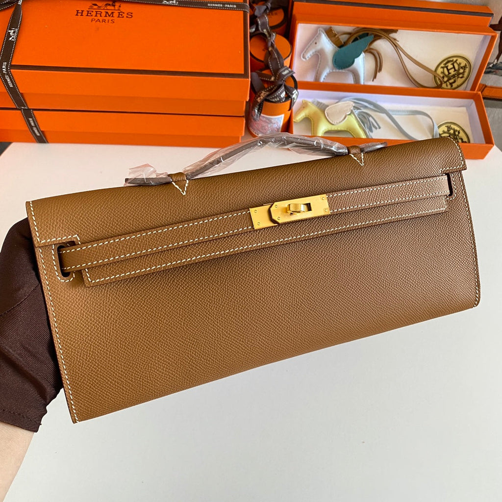 HERMES KELLY CUT 31 IN BRONZE BROWN CALFSKIN WITH GOLD HARDWARE