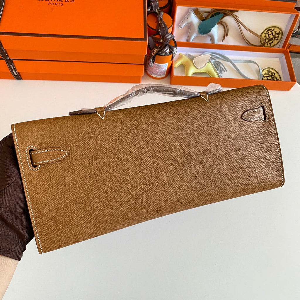 HERMES KELLY CUT 31 IN BRONZE BROWN CALFSKIN WITH GOLD HARDWARE