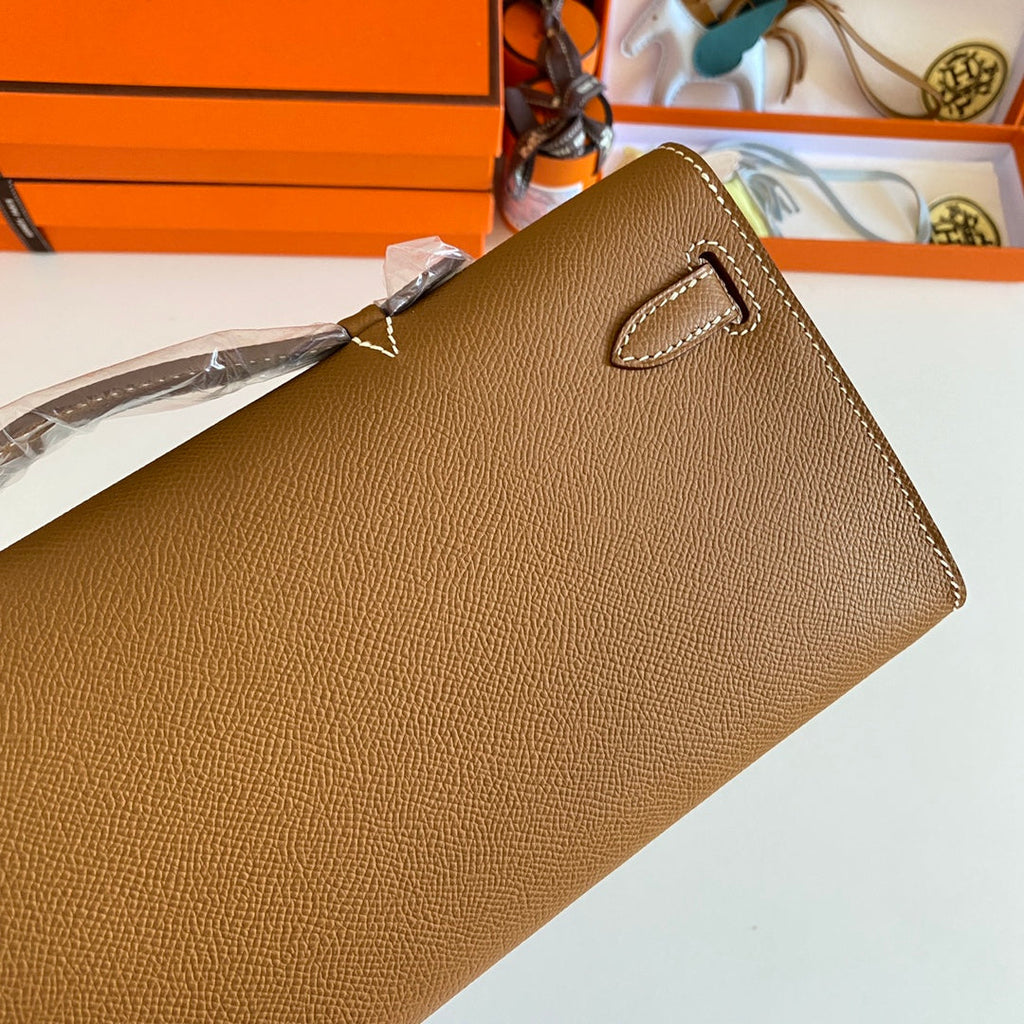 HERMES KELLY CUT 31 IN BRONZE BROWN CALFSKIN WITH GOLD HARDWARE