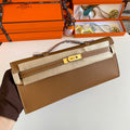 HERMES KELLY CUT 31 IN BRONZE BROWN CALFSKIN WITH GOLD HARDWARE