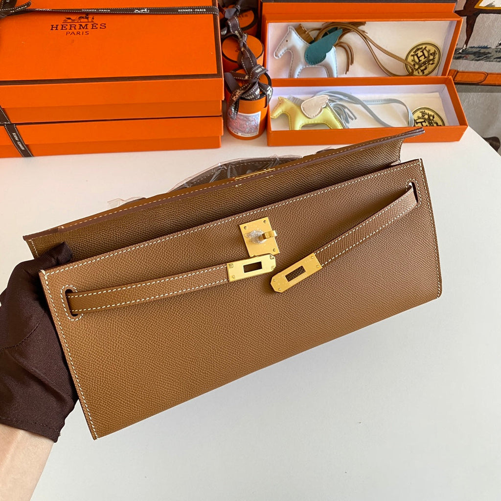 HERMES KELLY CUT 31 IN BRONZE BROWN CALFSKIN WITH GOLD HARDWARE