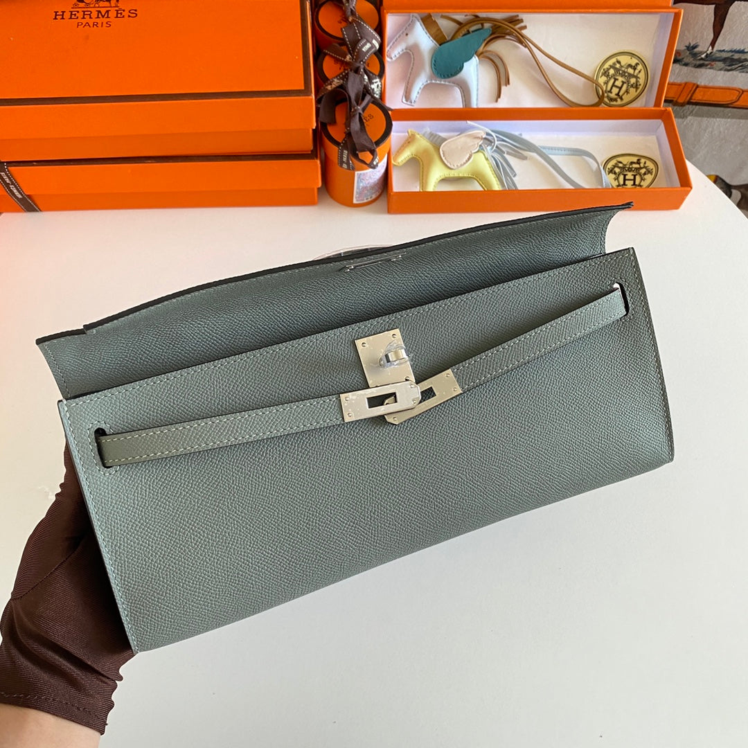 HERMES KELLY CUT 31 IN SEAFOAM GREEN CALFSKIN WITH SILVER HARDWARE
