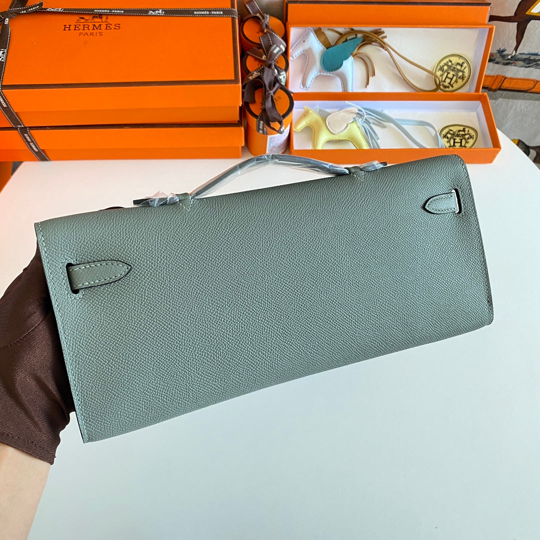 HERMES KELLY CUT 31 IN SEAFOAM GREEN CALFSKIN WITH SILVER HARDWARE