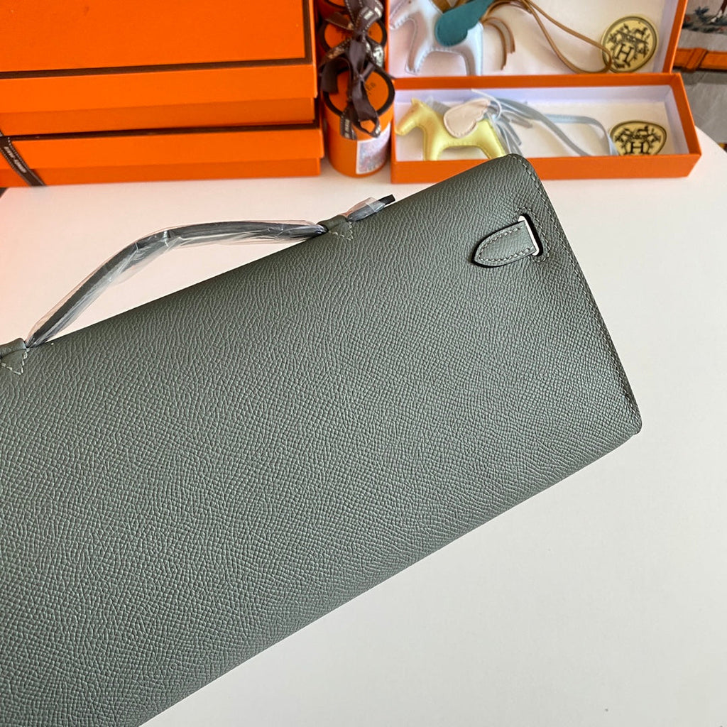 HERMES KELLY CUT 31 IN SEAFOAM GREEN CALFSKIN WITH SILVER HARDWARE