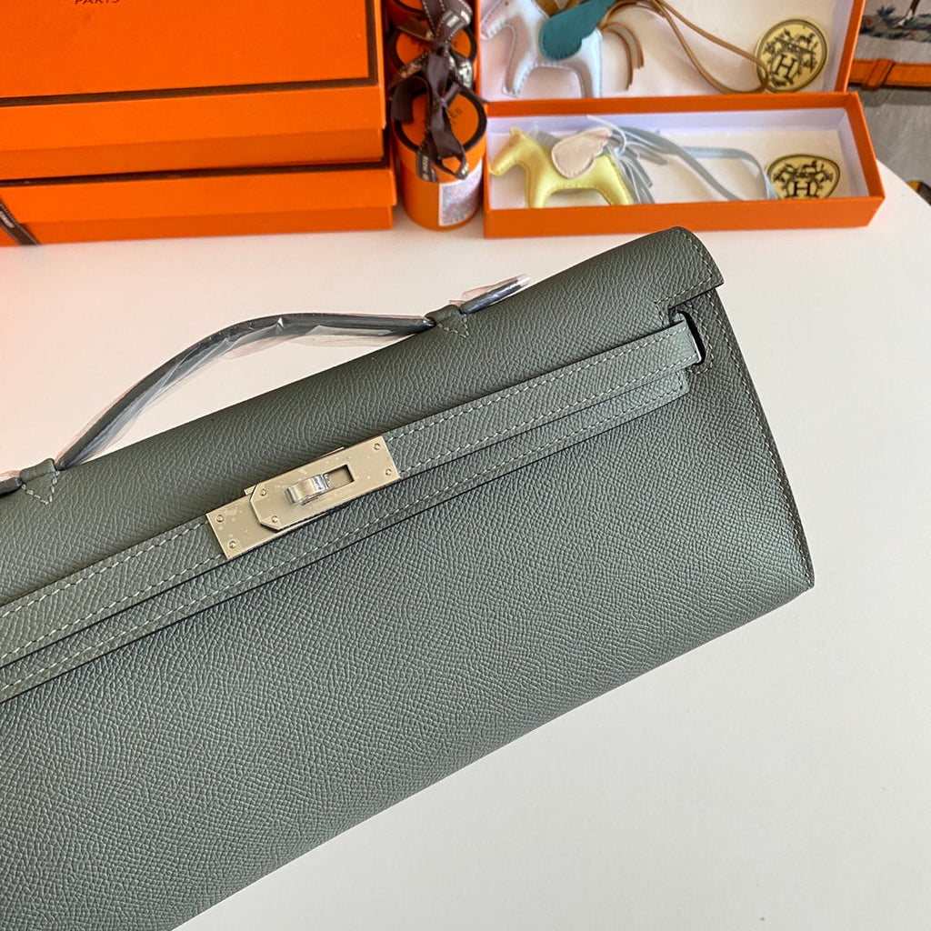 HERMES KELLY CUT 31 IN SEAFOAM GREEN CALFSKIN WITH SILVER HARDWARE
