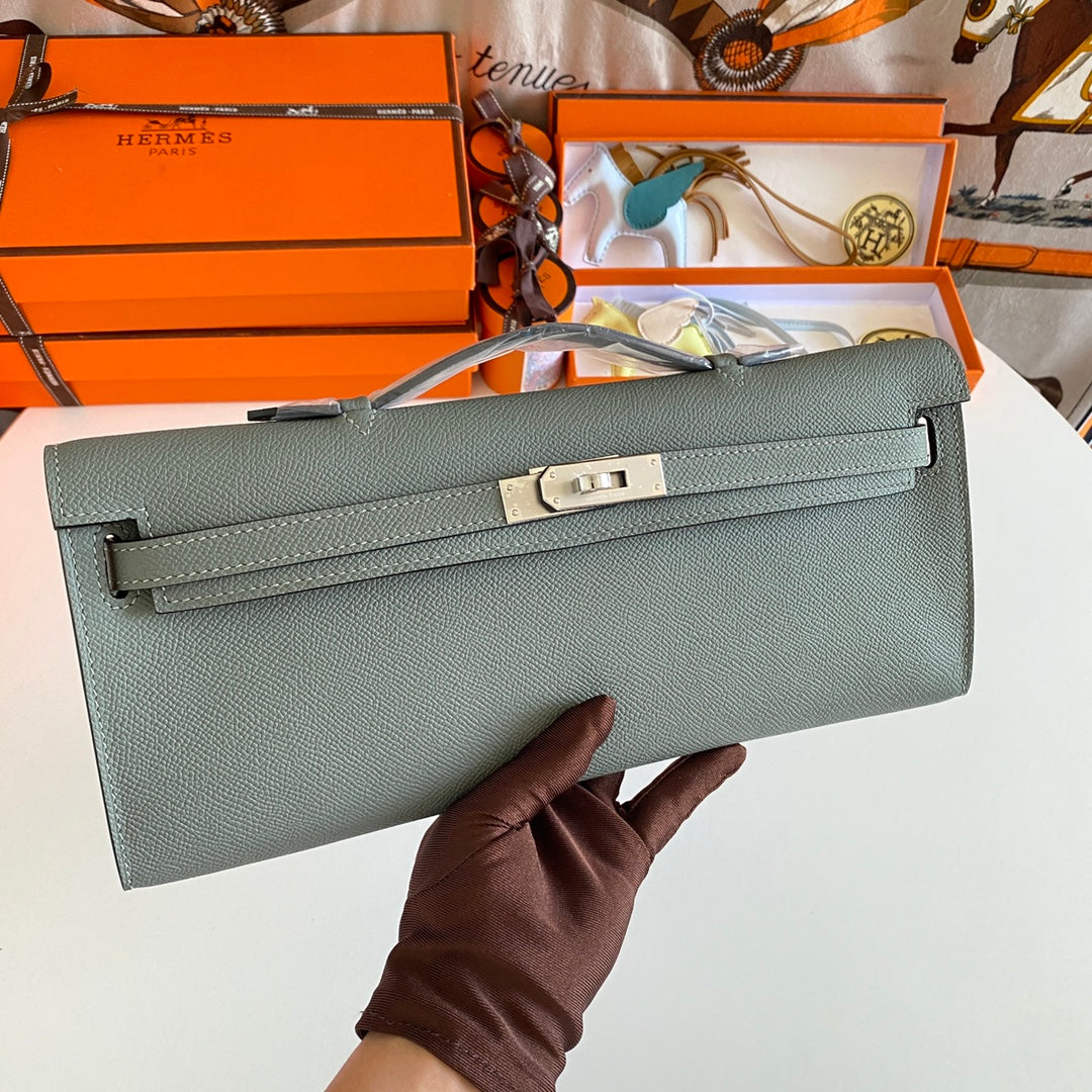 HERMES KELLY CUT 31 IN SEAFOAM GREEN CALFSKIN WITH SILVER HARDWARE