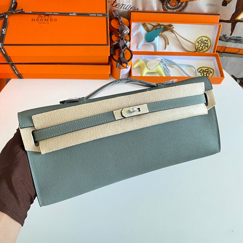 HERMES KELLY CUT 31 IN SEAFOAM GREEN CALFSKIN WITH SILVER HARDWARE