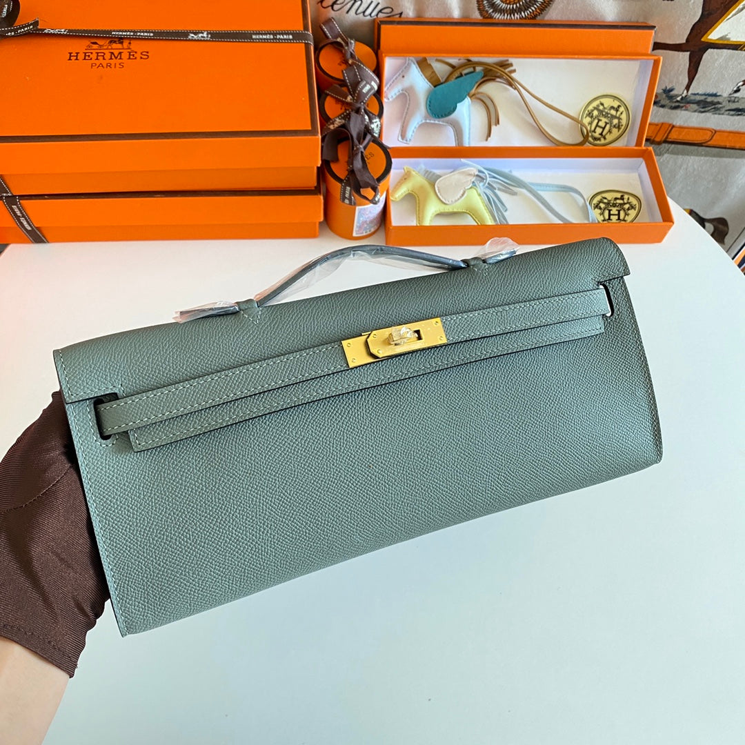 HERMES KELLY CUT 31 IN SEAFOAM GREEN CALFSKIN WITH GOLD HARDWARE
