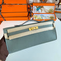 HERMES KELLY CUT 31 IN SEAFOAM GREEN CALFSKIN WITH GOLD HARDWARE